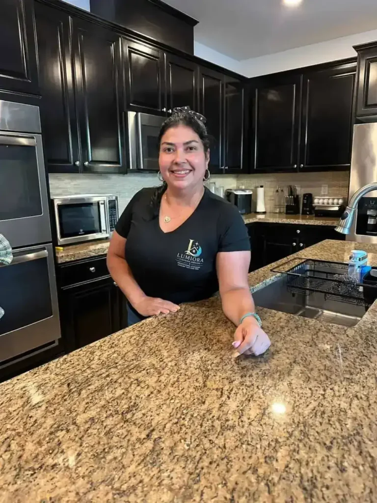 Lumiora Cleaning Services team member in a client's Moreno Valley kitchen